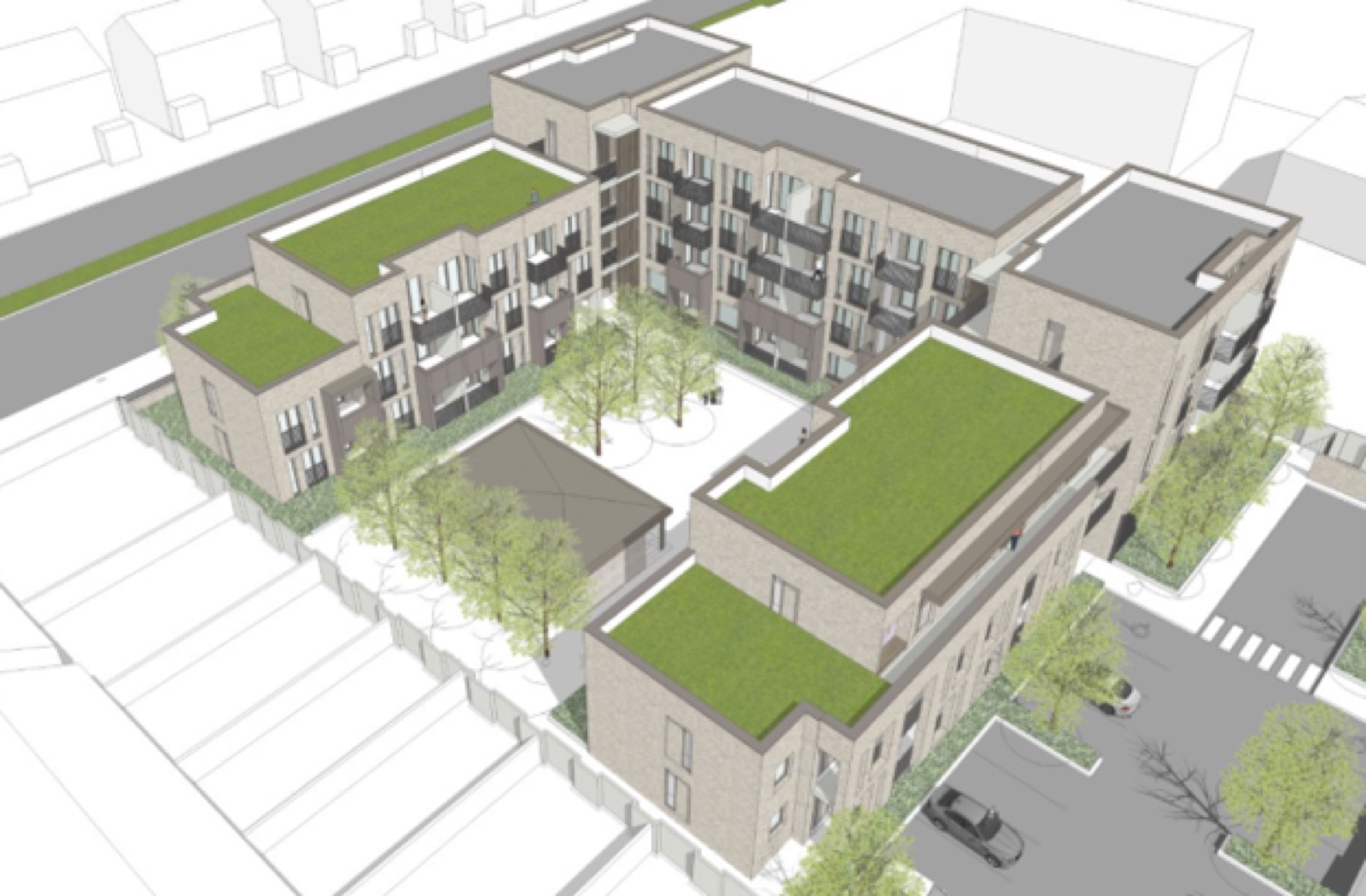 Aerial view of the development showing green roofs and internal courtyard